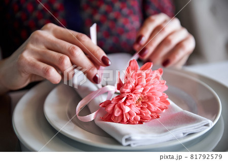 Girls sitting in a restaurant at a served table. Close-up, selective focus Girls sitting in a restaurant at a served table. Close-up, selective focus 81792579