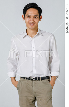 Young casual business man isolated. Young casual business man isolated. 81792595