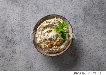 Baba ganoush Levantine cuisine appetizer from baked eggplant with parsley, garlic and olive oil. Baba ganoush Levantine cuisine appetizer from baked eggplant with parsley, garlic and olive oil. 81793610