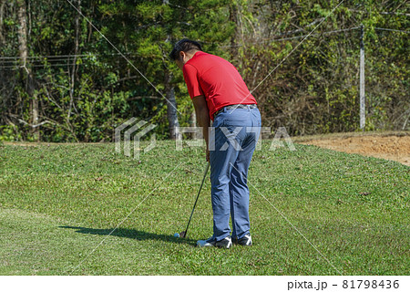 Golfer are playing game golf and hitting go on green grass mountain background. Asia male player game shot in summer. Sport holiday lifestyle concept. 81798436