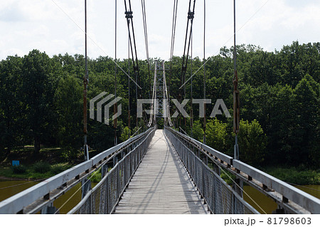 Pedestrian suspension bridge over river Neman Pedestrian suspension bridge over river Neman 81798603