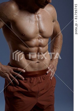 Muscular male athlete, photo shoot in studio Muscular male athlete, photo shoot in studio 81799745