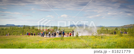 Geysir, Iceland - July 28, 2021: Geyser Strokkur in iceland errupting with hot water and steam, each year many tourists visit the geyser located in the golden circle 81821779