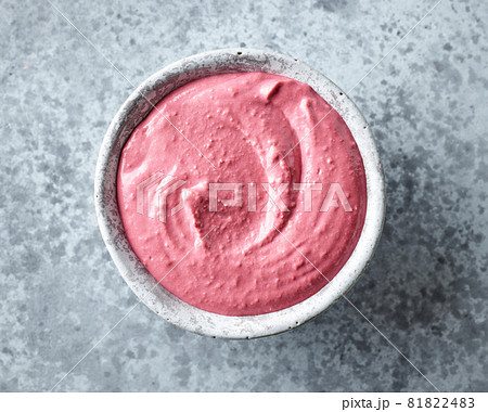 bowl of beetroot hummus 81822483