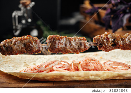 Caucasian beef lyulya kebab with marinated onion Caucasian beef lyulya kebab with marinated onion 81822848