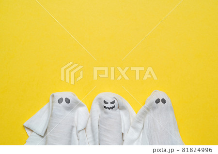 A group of ghosts with a vicious and distant look with copy space. Halloween holiday. A group of ghosts with a vicious and distant look with copy space. Halloween holiday. 81824996