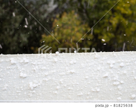 large hailstones fall on the window sill during the autumn rain large hailstones fall on the window sill during the autumn rain 81825638
