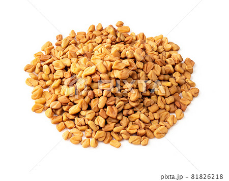 pile of Fenugreek seeds closeup on white background pile of Fenugreek seeds closeup on white background 81826218