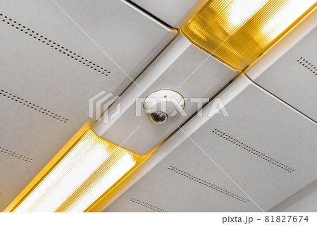 Surveillance camera on the ceiling of a modern electric train stadler Surveillance camera on the ceiling of a modern electric train stadler 81827674