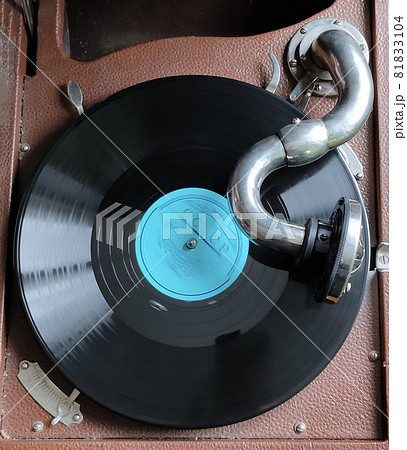 Old record player over white background. Old record player over white background. 81833104