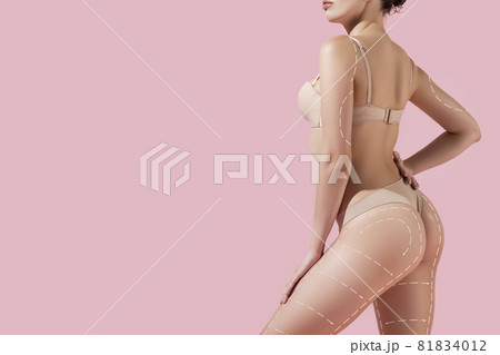 Close-up beautiful female body, buttocks with lifting up arrows isolated on pink background. Collage. Resilient skin, fitness body, anti cellulite procedures. Close-up beautiful female body, buttocks with lifting up arrows isolated on pink background. Collage. Resilient skin, fitness body, anti cellulite procedures. 81834012