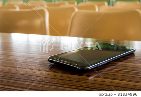 Empty tables and chairs that nobody sit in the seminar room Empty tables and chairs that nobody sit in the seminar room 81834996