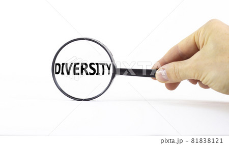 Diversity and inclusion symbol. Magnifying glass with word diversity on a beautiful white background. Businessman hand. Business, diversity and inclusion concept, copy space. 81838121