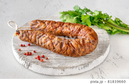 Spanish chorizo on the white background Spanish chorizo on the white background 81839660