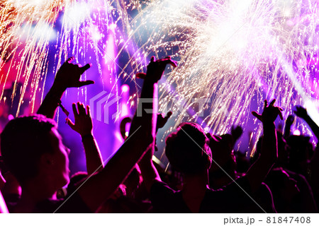 Cheering crowd and fireworks 81847408