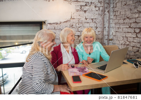 Three fashion designers discussing a new project Three fashion designers discussing a new project 81847681