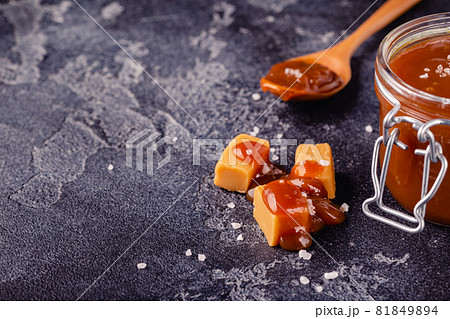 Glass jar with tasty delicious salted caramel Glass jar with tasty delicious salted caramel 81849894