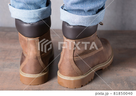 pair of brown nubuck leather boots, back view, concept shoes pair of brown nubuck leather boots, back view, concept shoes 81850040