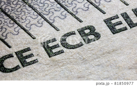 Macro close up of a five euro banknote. A sharp detailed capture of the ecb character on the 5 euro note. the embossing of the print nicely to see. microscopic view of the paper fiber and the ink  81850977