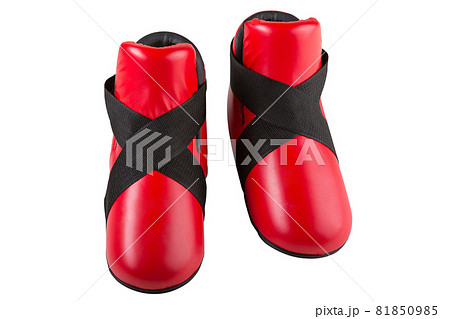 red shoes for karate or boxing, two shoes, leg protection, on a white background, isolate red shoes for karate or boxing, two shoes, leg protection, on a white background, isolate 81850985
