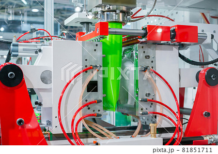 Automatic blow molding machine: manufacturing of empty green plastic jerrycans Automatic blow molding machine: manufacturing of empty green plastic jerrycans 81851711