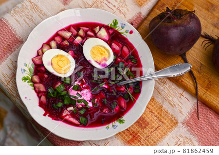 beetroot cold soup with cucumbers, boiled egg, green onion, garlic and sour cream beetroot cold soup with cucumbers, boiled egg, green onion, garlic and sour cream 81862459