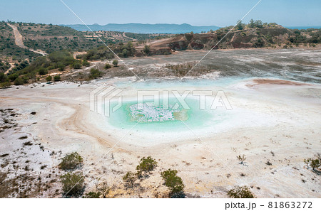 Open pit of old copper mine with dried polluted lake bed in Limni, Cyprus Open pit of old copper mine with dried polluted lake bed in Limni, Cyprus 81863272