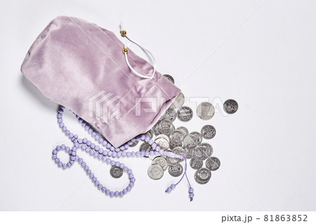 Concept of islamic finance on white background. Sharia-compliant finance - banking or financing activity. Coins and praying beads. Zakat, islamic banking 81863852