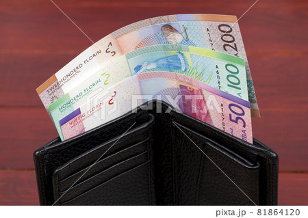 Aruban money - florin in the black wallet Aruban money - florin in the black wallet 81864120