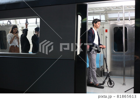 Passenger with casual suit  in the Skytrain rails or subway for travel in the big city, lifestyle and transportation concept 81865613
