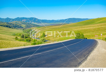 a new paved country road snaking away into the distance a new paved country road snaking away into the distance 81870577