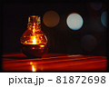 Alcohol lamps on the table in the dark night with bokeh effect 81872698