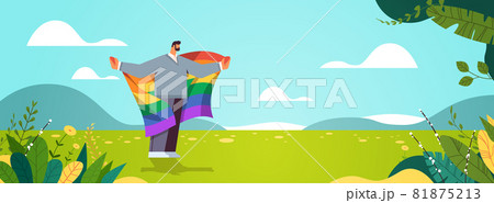 man holding lgbt rainbow flag gay lesbian love parade pride festival transgender love concept 81875213