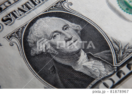 Macro close up of a 1 US dollar banknote. Close up of a one American dollar note. US dollar is the world currency. The portrait of George Washington, the first president of the United States. Macro close up of a 1 US dollar banknote. Close up of a one American dollar note. US dollar is the world currency. The portrait of George Washington, the first president of the United States. 81878967