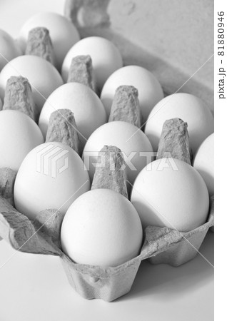 Fresh organic white eggs in a carton package, isolated on white background Fresh organic white eggs in a carton package, isolated on white background 81880946