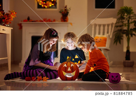 Kids in witch costume on Halloween trick or treat Kids in witch costume on Halloween trick or treat 81884785