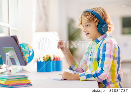 Online remote learning. School kids with computer. Online remote learning. School kids with computer. 81884787