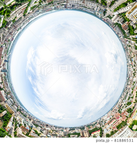 Aerial city view with crossroads and roads, houses, buildings, parks and parking lots. Sunny summer panoramic image Aerial city view with crossroads and roads, houses, buildings, parks and parking lots. Sunny summer panoramic image 81886531