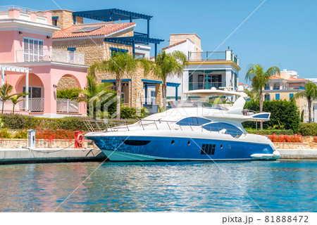 Yacht moored close to luxury residence at Limassol Marina, Cyprus 81888472