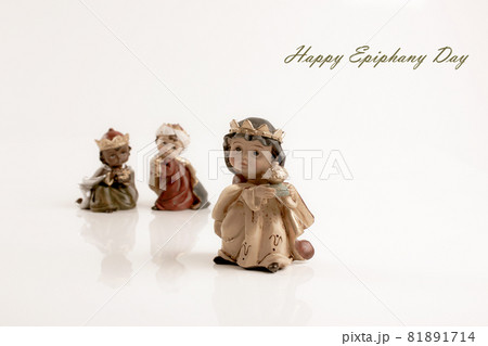 Happy Epiphany day concept. Three ceramic figures of wise boys isolated on white background. Happy Epiphany day concept. Three ceramic figures of wise boys isolated on white background. 81891714