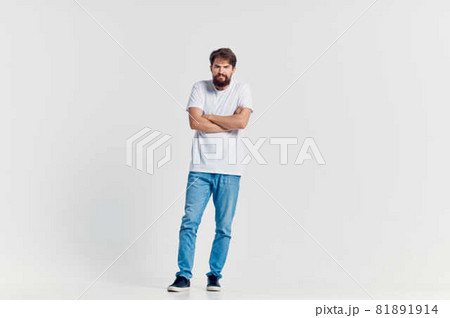 man in white t-shirt movement positive light background man in white t-shirt movement positive light background 81891914