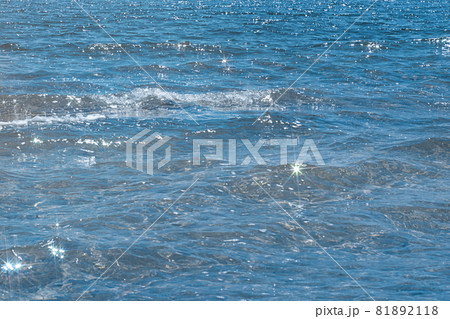 Detail of a sunlight reflecting in glittering sea. Powerful and peaceful nature concept. Detail of a sunlight reflecting in glittering sea. Powerful and peaceful nature concept. 81892118