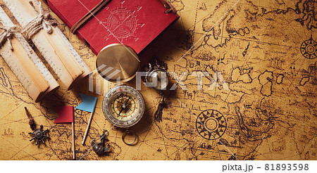 Happy Columbus Day concept. Vintage compass and treasure manuscript.  Flat lay, top view with copy space. 81893598
