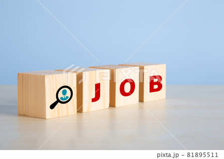 The word job on wooden cubes with on blue background. 81895511