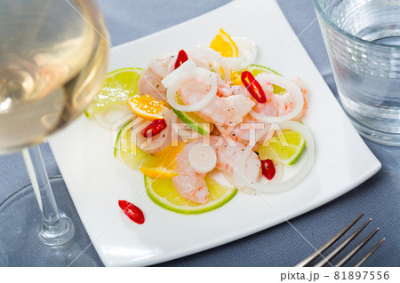 Ceviche with shrimps, lime, orange Ceviche with shrimps, lime, orange 81897556