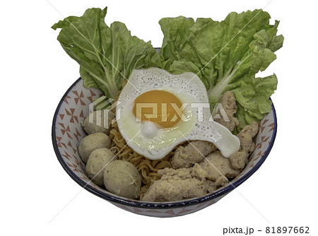 Boil egg noodles with pork ball, minced pork, fried egg and vegetables isolated on white background with clipping path. Boil egg noodles with pork ball, minced pork, fried egg and vegetables isolated on white background with clipping path. 81897662