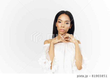 woman of african appearance fashionable hairstyle cosmetics posing closeup woman of african appearance fashionable hairstyle cosmetics posing closeup 81903851