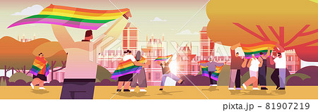 mix race people holding lgbt rainbow flags gay lesbian love parade pride festival transgender love concept 81907219