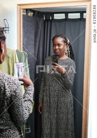 Woman making selfie in the fitting room 81908286