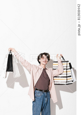 Happy customer with shopping bags Happy customer with shopping bags 81908442